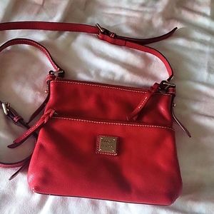 Dooney & Bourke Crossbody with adjustable straps - Condition is good!